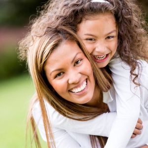 Mom and Daughter smiling